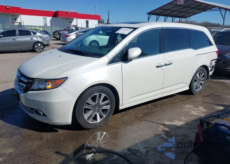 2014 Honda Odyssey Touring/Touring Elite z USA, uszkodzony, nr VIN 5FNRL5H93EB004051